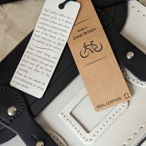 The Cambridge satchel company, the little one, black and white crossbody bag.